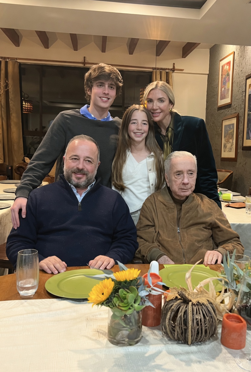 Three generations of the founder's family gathered around the Thanksgiving table
